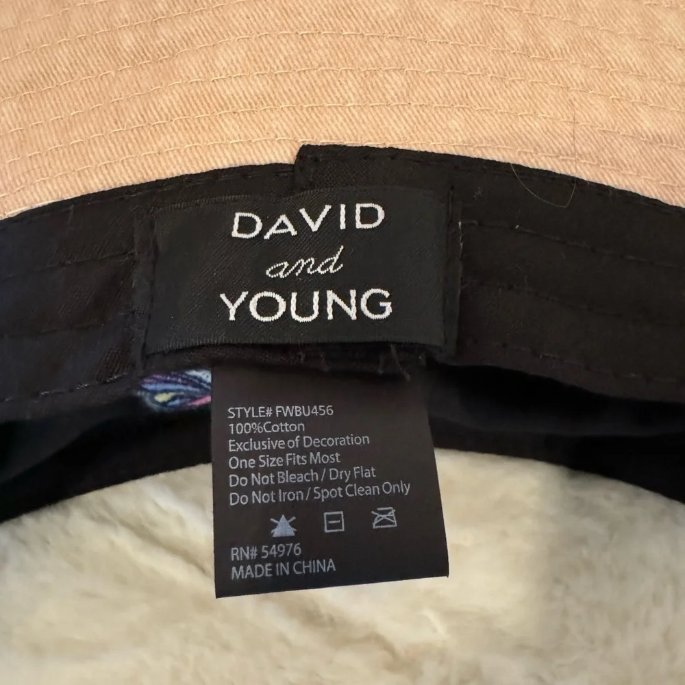 David and Young Khaki colored Bucket Hat. Has a Butterfly on the front New